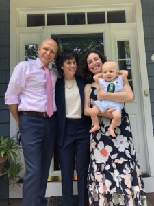 Rabbi Gloria with a couple and their baby